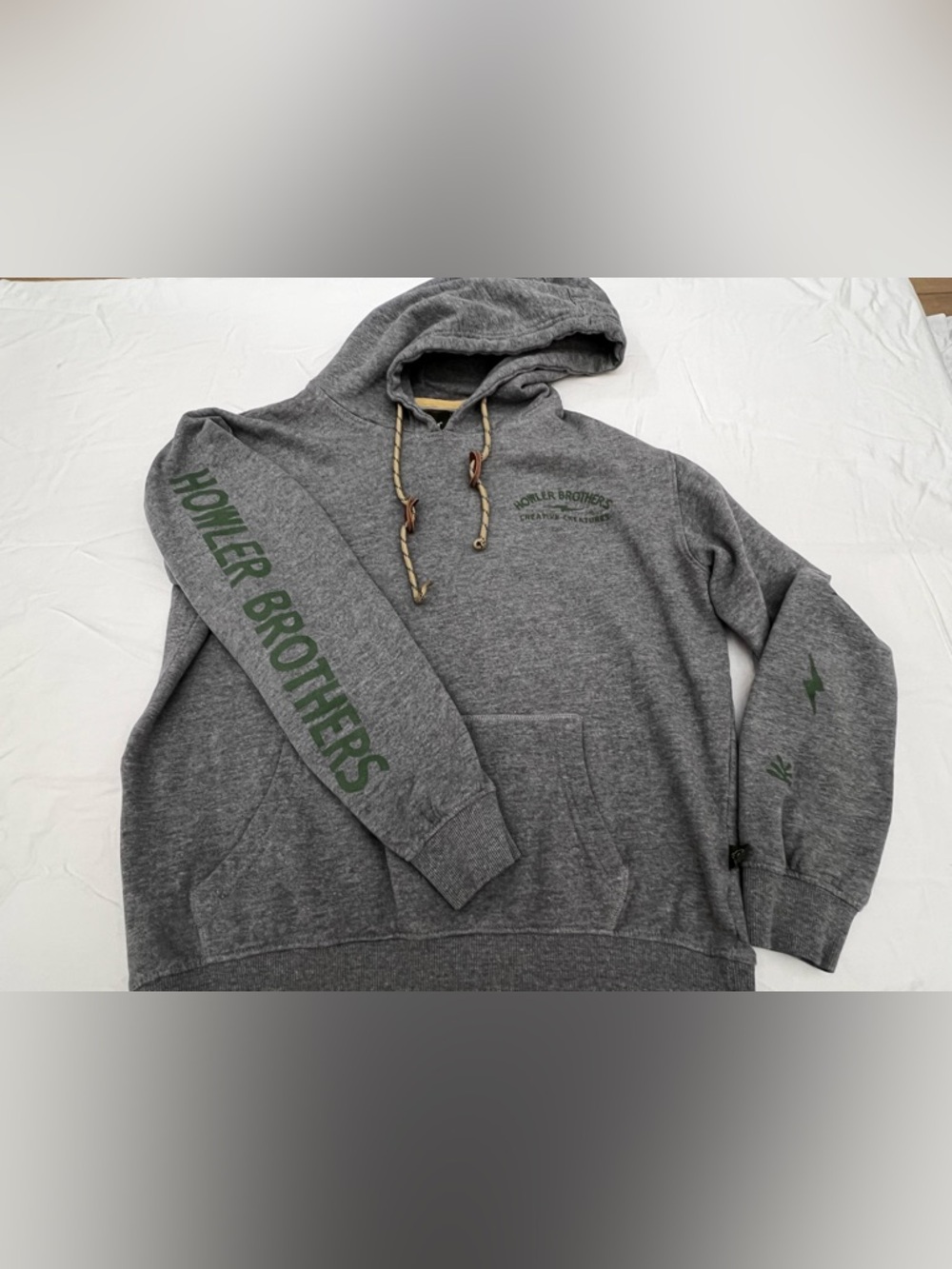 Howler Brothers Gray Hoodie with Green Sleeve Logo